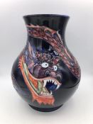 A Moorcroft vase, 24cm, Discontinued Blue Dragon