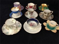 A selection of china coffee cups by various makers