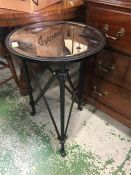 Three round mirrored metal tables