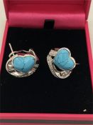 A pair of silver CZ turquoise earrings