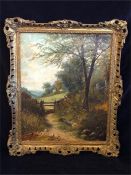 An oil on canvas of a country scene signed bottom right and dated 1883