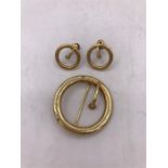 A Brooch and earring set marked 14ct gold.