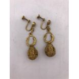 A pair of Asian Gold earrings