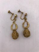 A pair of Asian Gold earrings