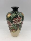 A Moorcroft 16cm tall vase