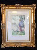 A watercolour of a Shepherdess with her sheep signed by R Gibson 1919 in gilt frame.