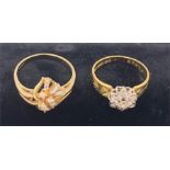 A 9ct gold floral diamond ring (2.6g) and an 18ct gold Diamond daisy ring (3.3g)