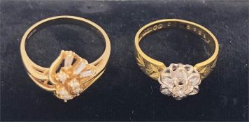 A 9ct gold floral diamond ring (2.6g) and an 18ct gold Diamond daisy ring (3.3g)