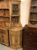 An Antique pine corner cabinet or washstand with lift up washbasin section, mirrored section and