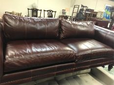 A Three seater Ralph Lauren Brown leather sofa