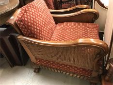 A pair of lattice backed, plantation style chairs