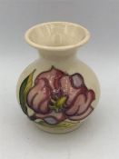 A Moorcroft vase cream with pink flowers. 9cm