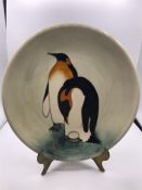 A Moorcroft Penguin Plate 19/150 diameter 26cm.