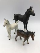A selection of three Beswick Horses