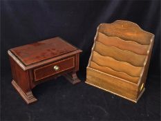 A wooden letter tray and desk tidy