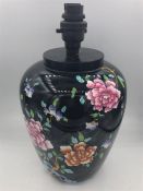 A Sheraton Wood & Sons floral lamp base.