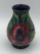 A Moorcroft vase 10cm with poppies.