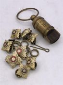 A Brass cased Titanic whistle and a selection of military buttons.