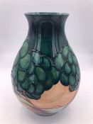 A Moorcroft vase 18cm tall