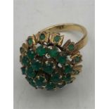 An 18ct gold green cocktail ring