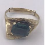An Emerald ring in a gold setting