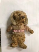 A small vintage teddy bear 26cm.