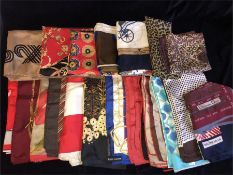 A collection of vintage silk scarves to include Daks, Ralph Lauren, Christian Dior and Liberty.