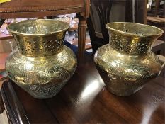 A Pair of Brass Chinese vases.