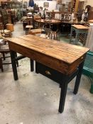 A pine topped and hand painted desk with black legs and brass cup handle.