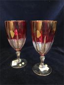 Two Red Bohemian Glasses with gold detail.
