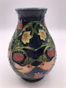 A Moorcroft strawberry vase M/640