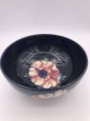 A Moorcroft bowl in the Anemone pattern.