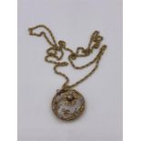 A 9ct gold necklace and pendant