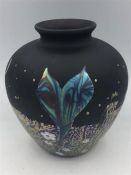 An Okra England Black glass painted vase 14cm tall, signed to base.