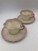 A pair of Vintage Belleek cups and saucers