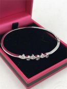 A silver and CZ bangle