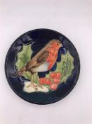 A Moorcroft Robin and Holly small plate M/2239 12cm diameter.
