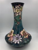 A Moorcroft vase 28cm tall.