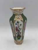 A Dresden vase, with bird decoration.