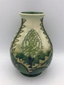 A Moorcroft Green Tree vase 19cm