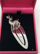 A silver bookmark with Deer finial