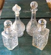 Four glass decanters