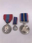 An Imperial service and National service medal, copies.