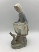 A Lladro lady with a rabbit