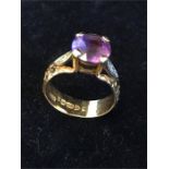 An 18ct gold ring with Amethyst