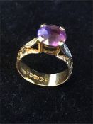 An 18ct gold ring with Amethyst