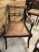 A Regency cane seated chair., with brass decoration.