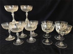 Seven Champagne Coupes with etched detail and four details.