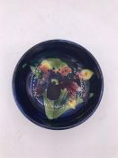 A Moorcroft pin dish with the By Appointment to Queen Mary sticker to base.