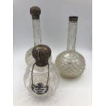 Three cut glass silver scent bottles